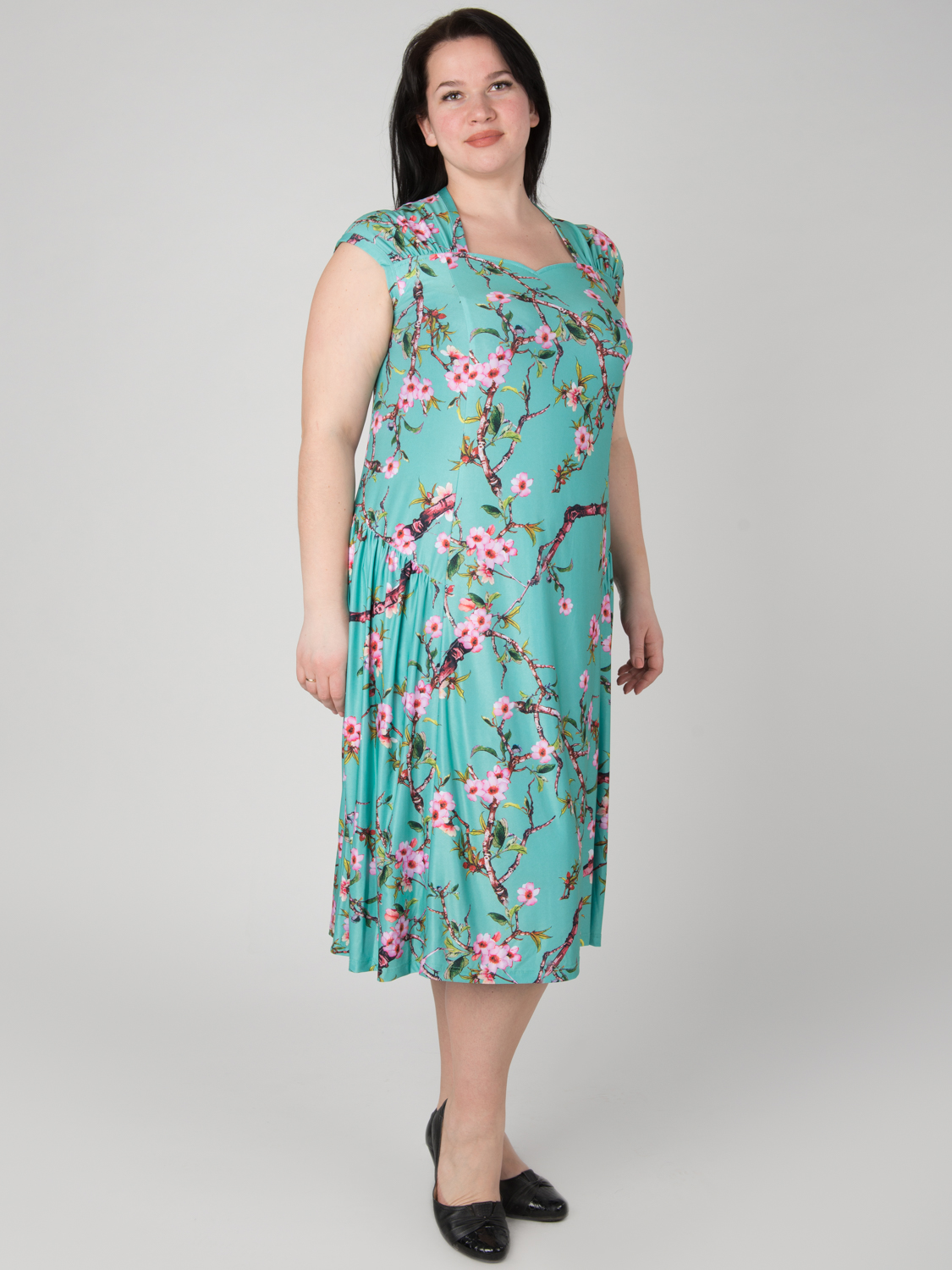 Платье бирюзовое с цветами большого размера