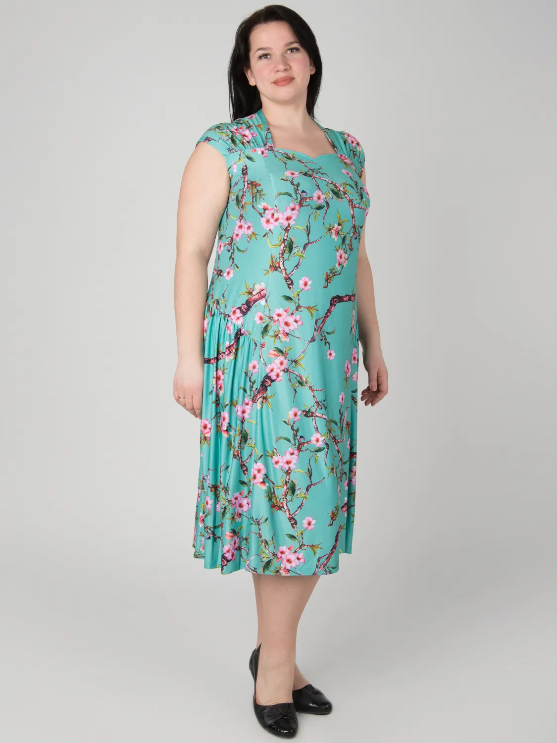 Платье бирюзовое с цветами большого размера